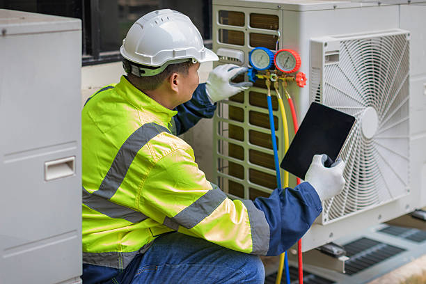 Professional Heat Pump Repair technician working in Fort Bliss, TX
